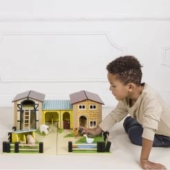 Wooden Farmyard Stables 11 Wooden Farmyard Stables -Kids Toys Store TV410 boy sorting farm animals at the farmyard